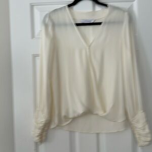 Pretty Intermix off-white classic blouse.